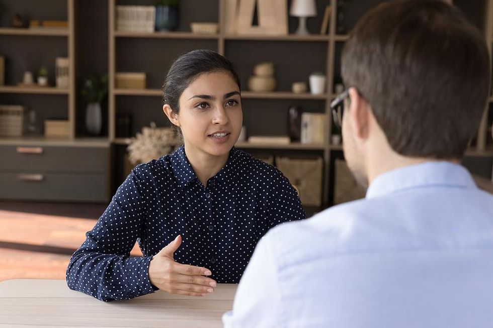 Woman answers a question during a job interview