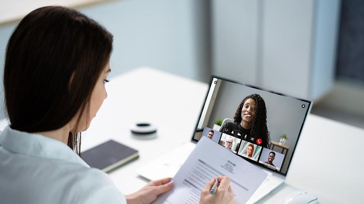Woman answers a question during a virtual job interview