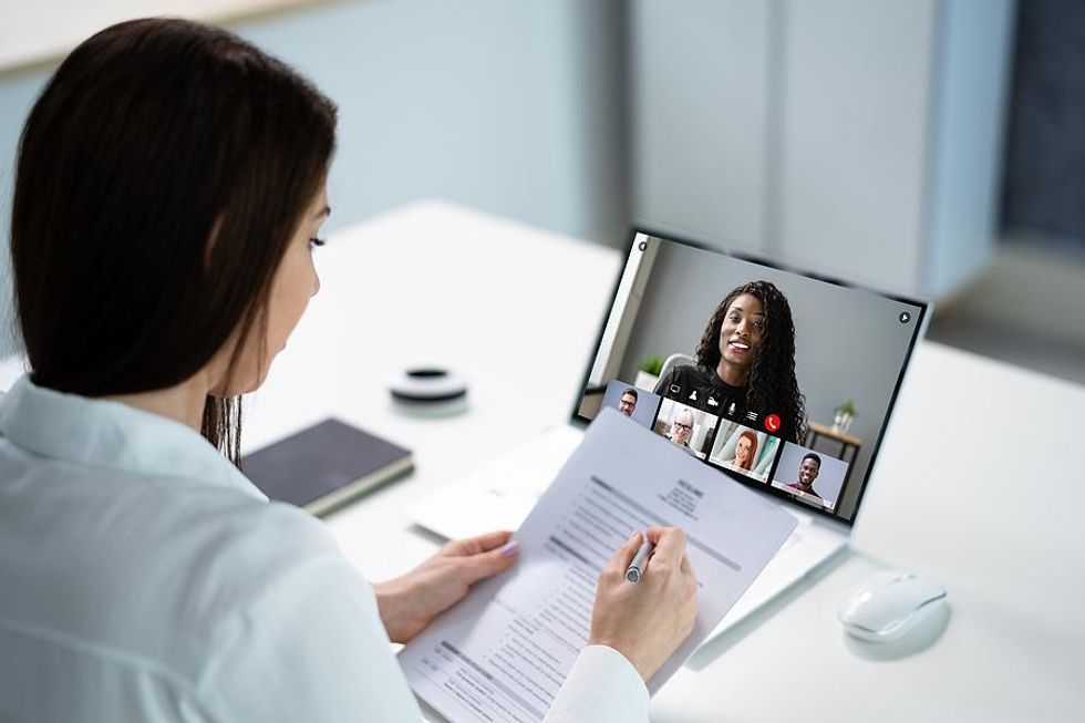 Woman answers a question during a virtual job interview