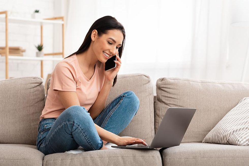 Woman asks a question during a phone interview