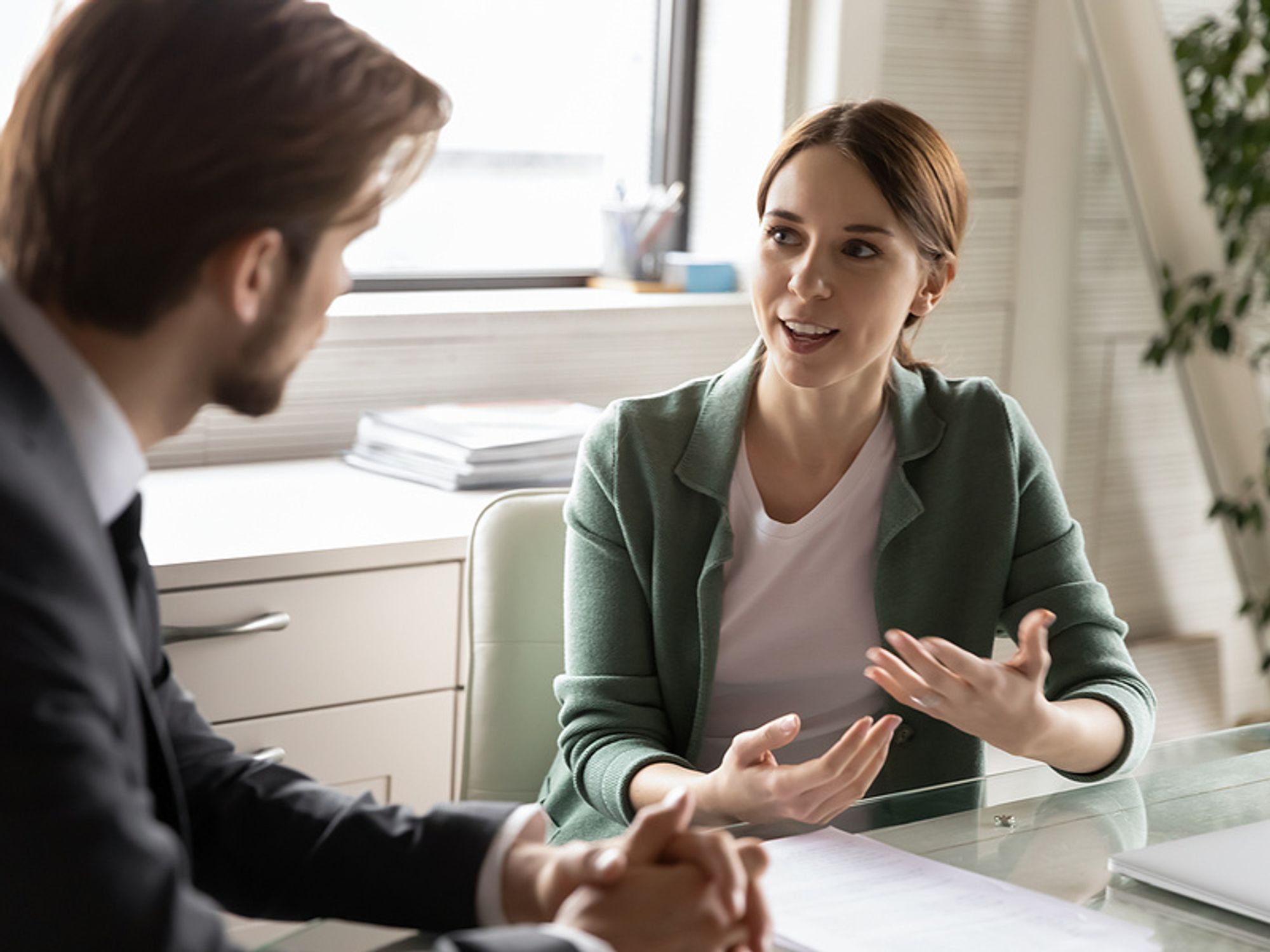 Woman asks her boss for a raise
