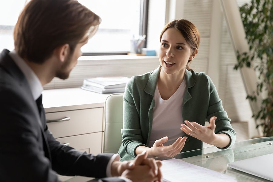 Woman asks her boss for a raise