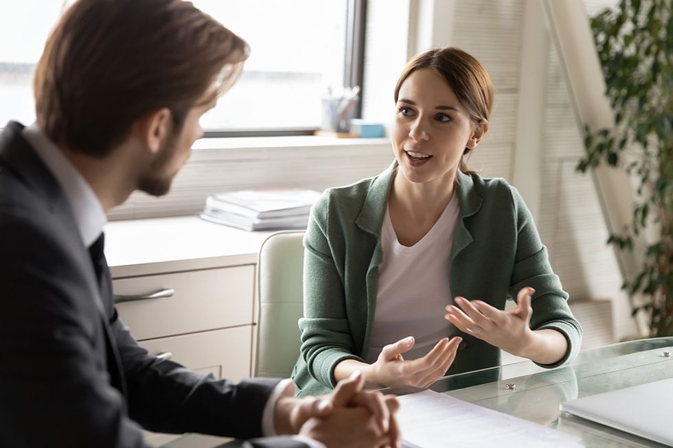 Woman asks her boss for a raise