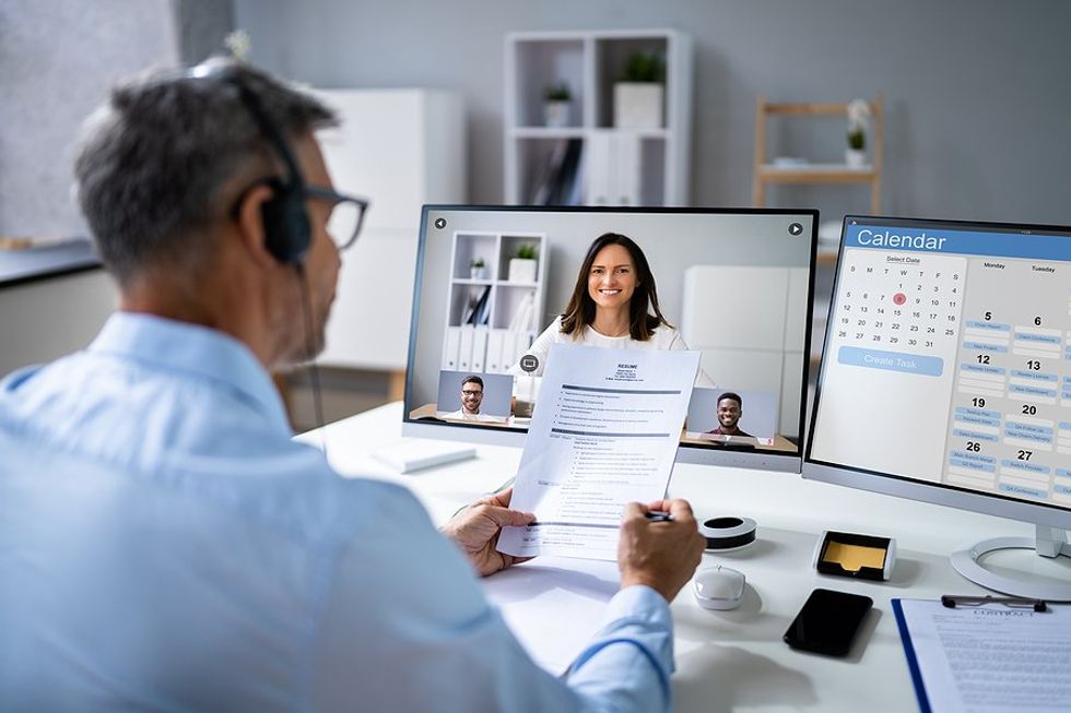 Woman attends a virtual job interview