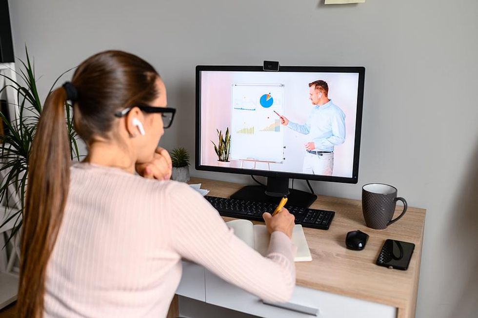 Woman attends a virtual work training
