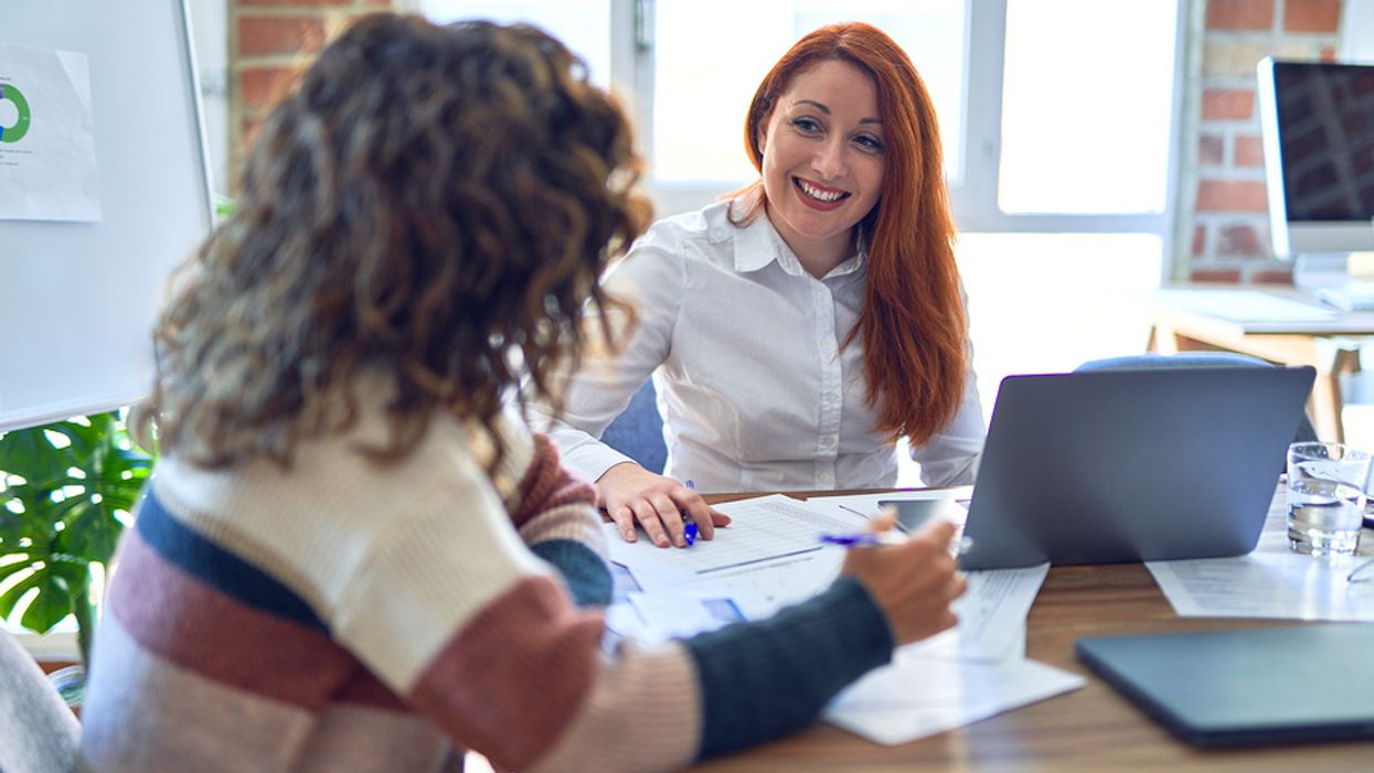 Woman connects with her new boss during a work meeting