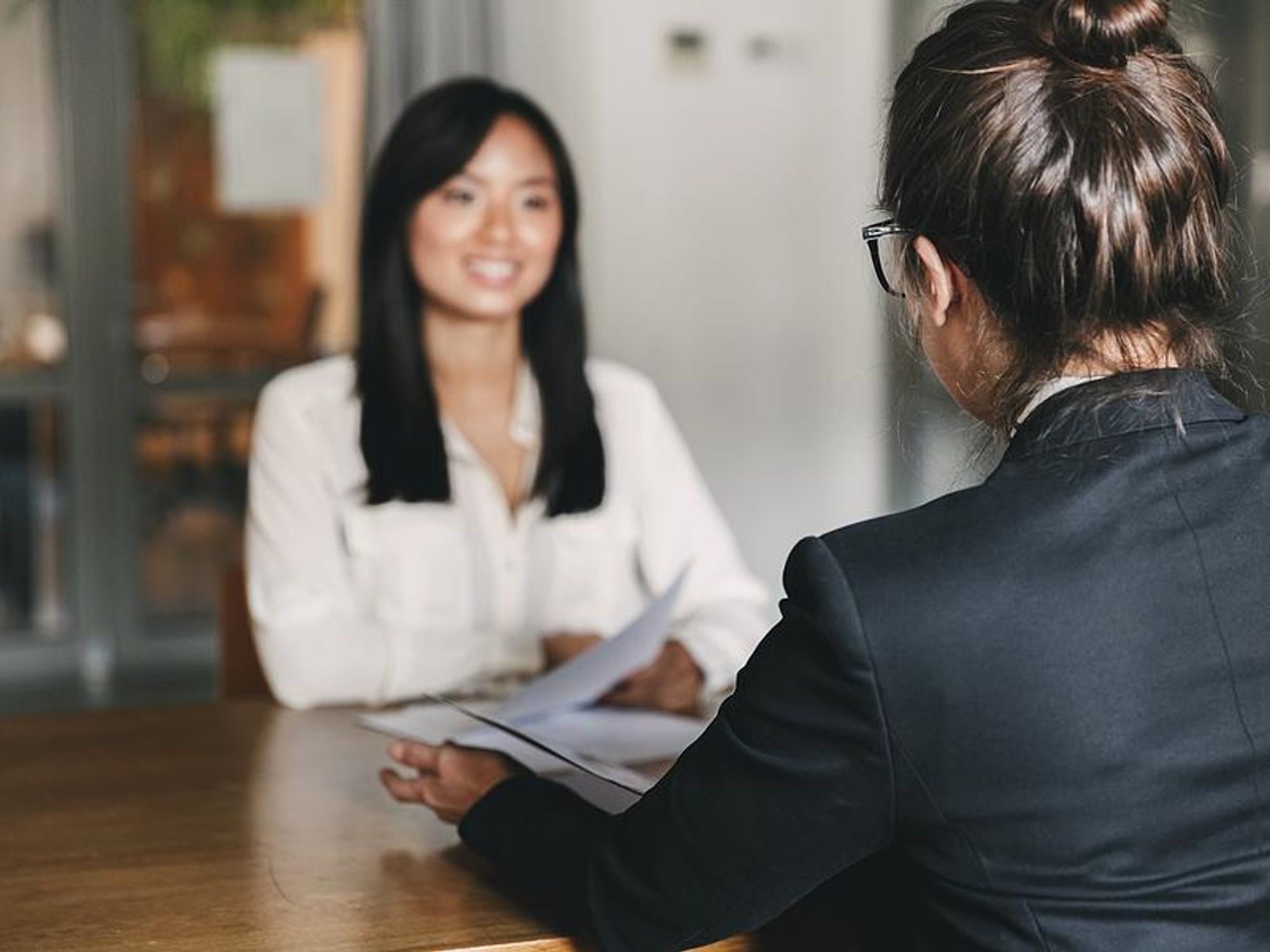 Woman demonstrates her value in a job interview