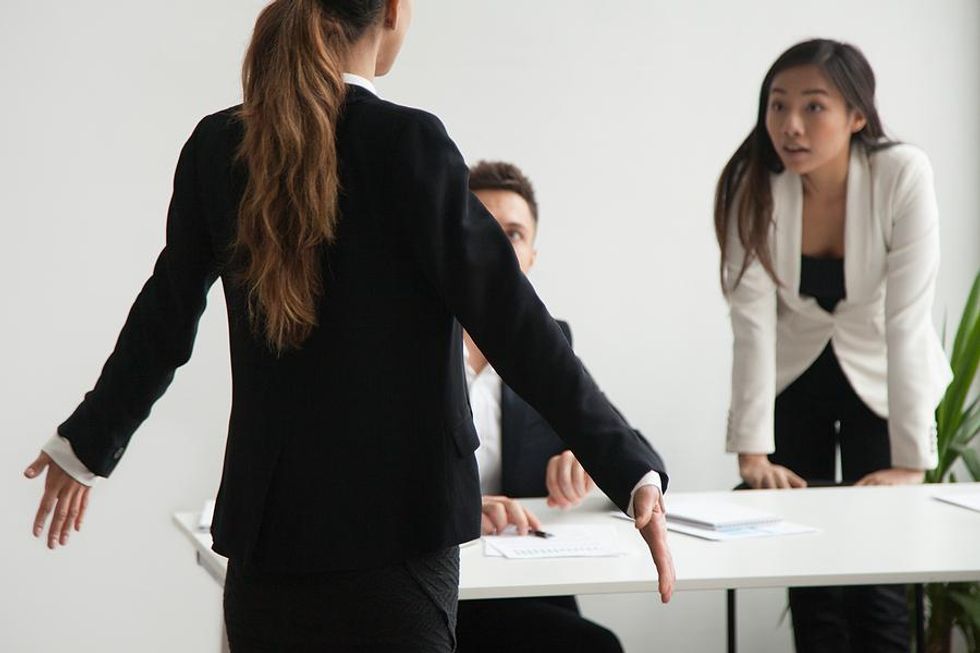 Woman disagrees with her boss during a meeting