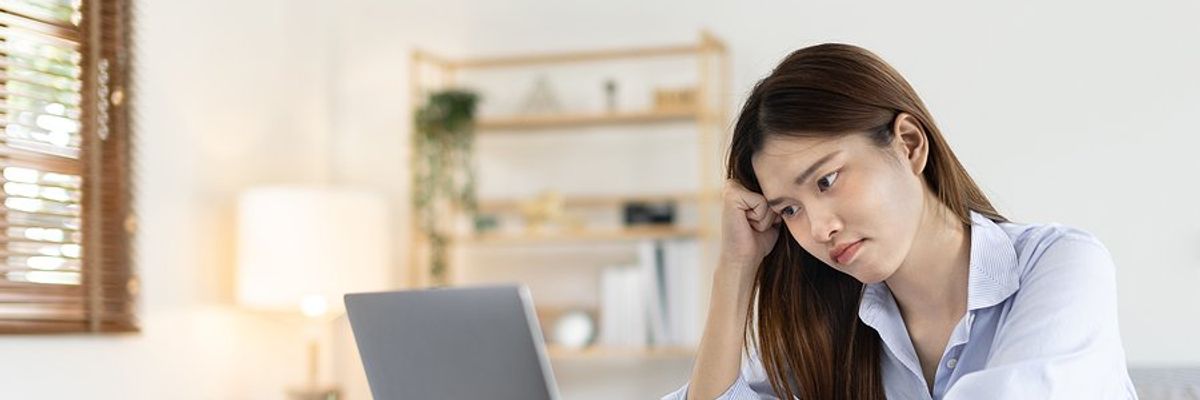 Woman disappointed about a failure at work
