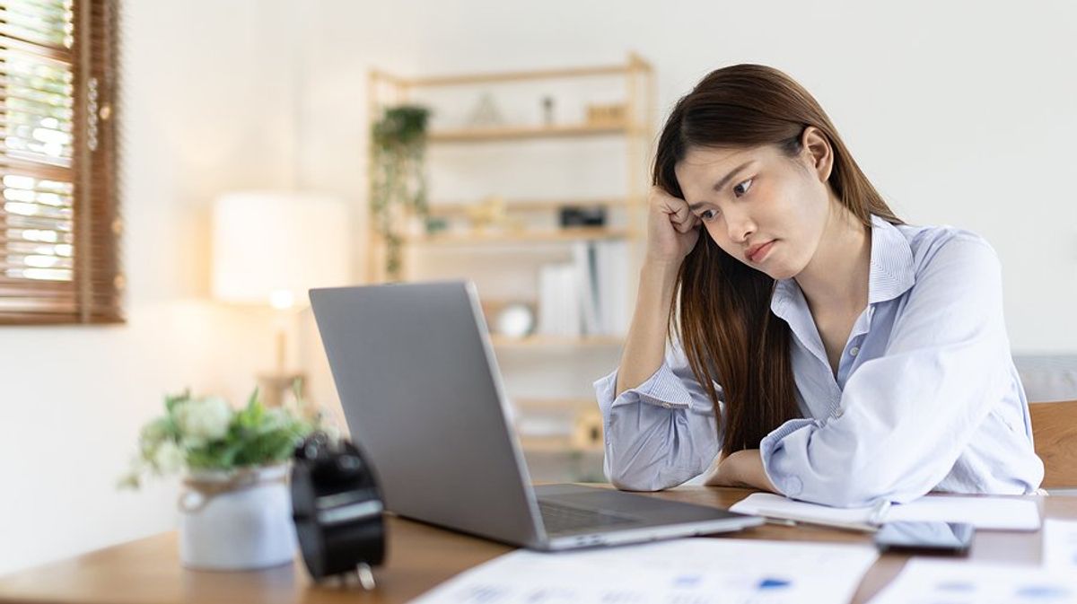 Woman disappointed about a failure at work