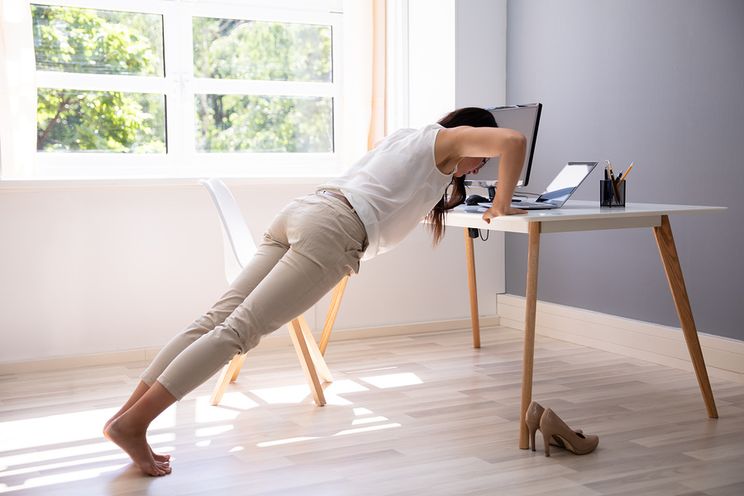 5 Quick And Simple Exercises You Can Do At Your Desk - Work It Daily