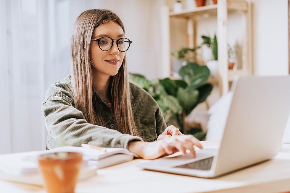 Woman edits her resume so it stands out to employers