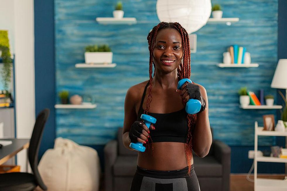 Woman exercises after working a desk job all day