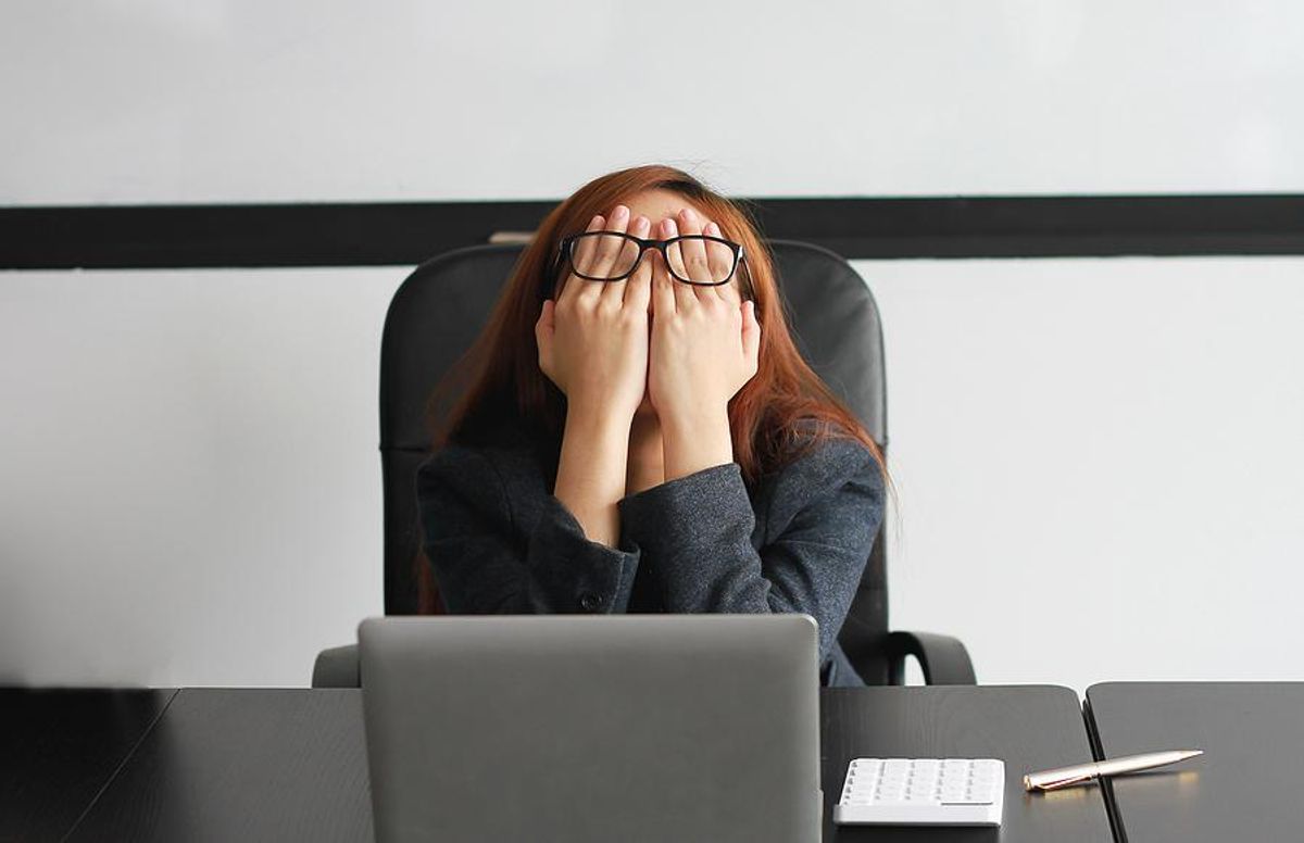 Woman experiencing job burnout