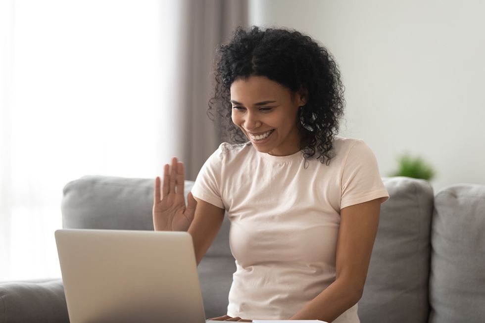 Woman finishes her video interview