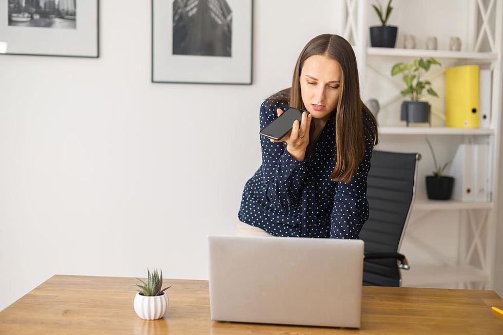 Woman gets a call from a recruiter at a bad time