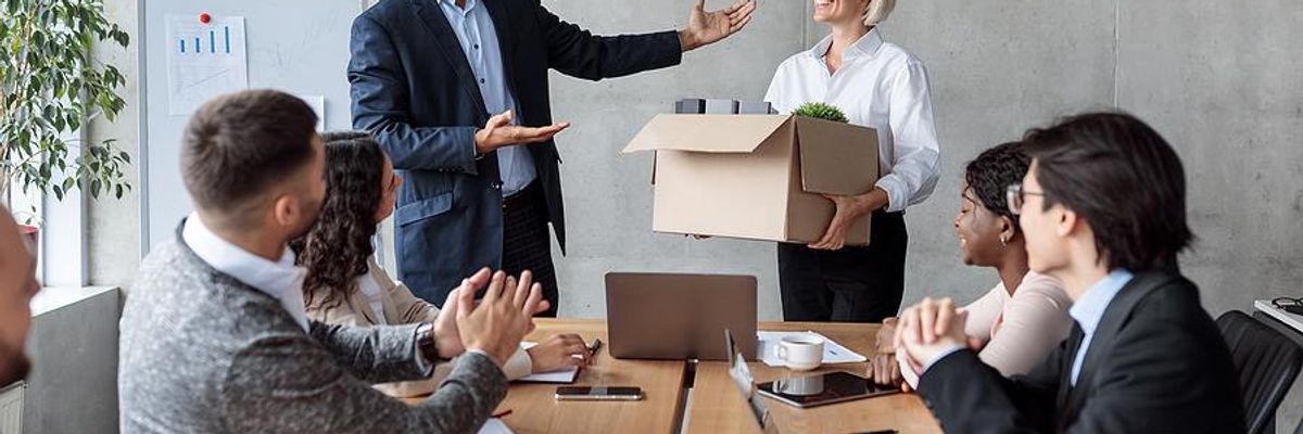 Woman gets introduced by her boss at her new job