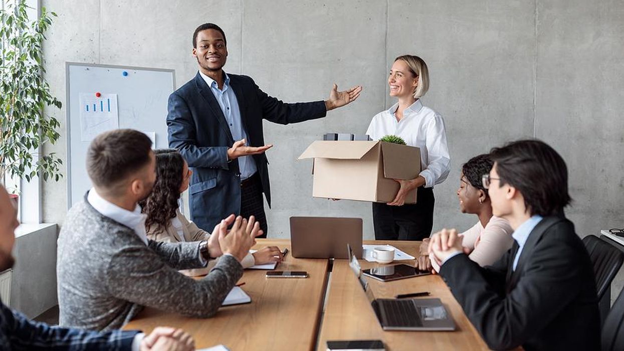 Woman gets introduced by her boss at her new job