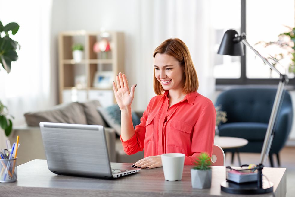 Woman goes on a virtual interview during her remote job search