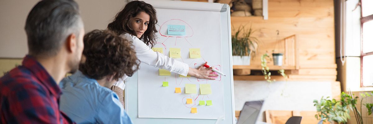 Woman implements root cause analysis procedures at work