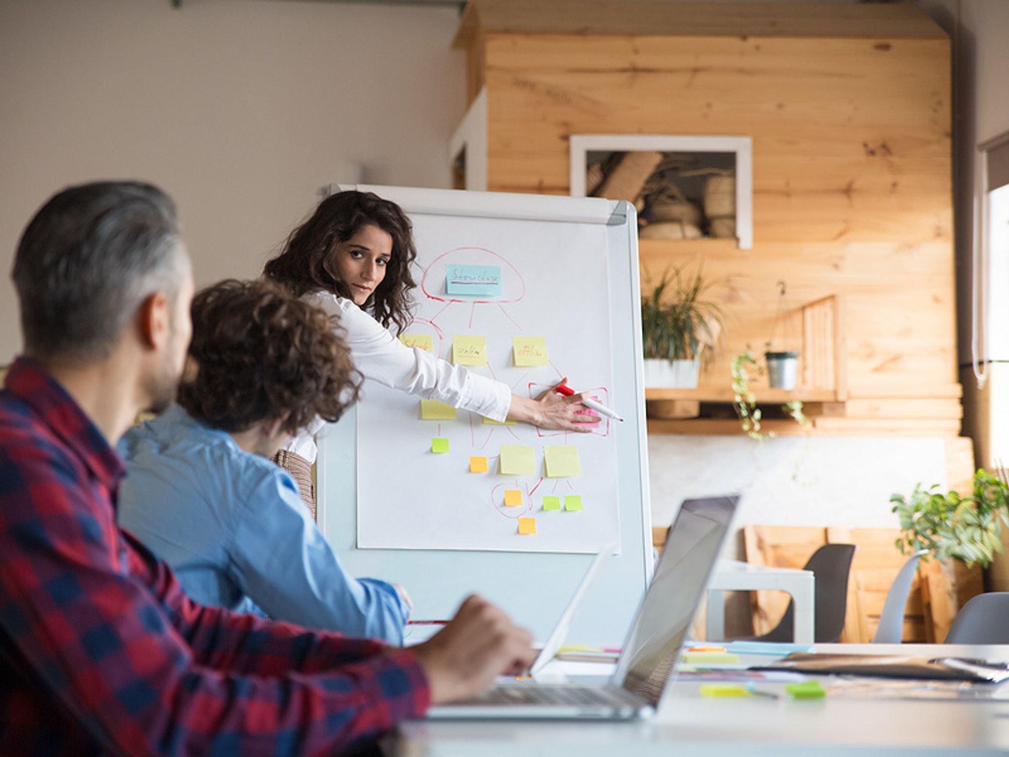 Woman implements root cause analysis procedures at work