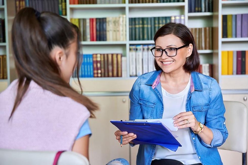 Woman interviews a job candidate for an open position