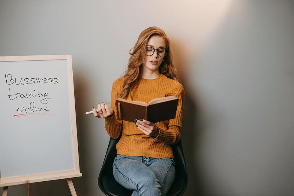 Woman leads a training at work