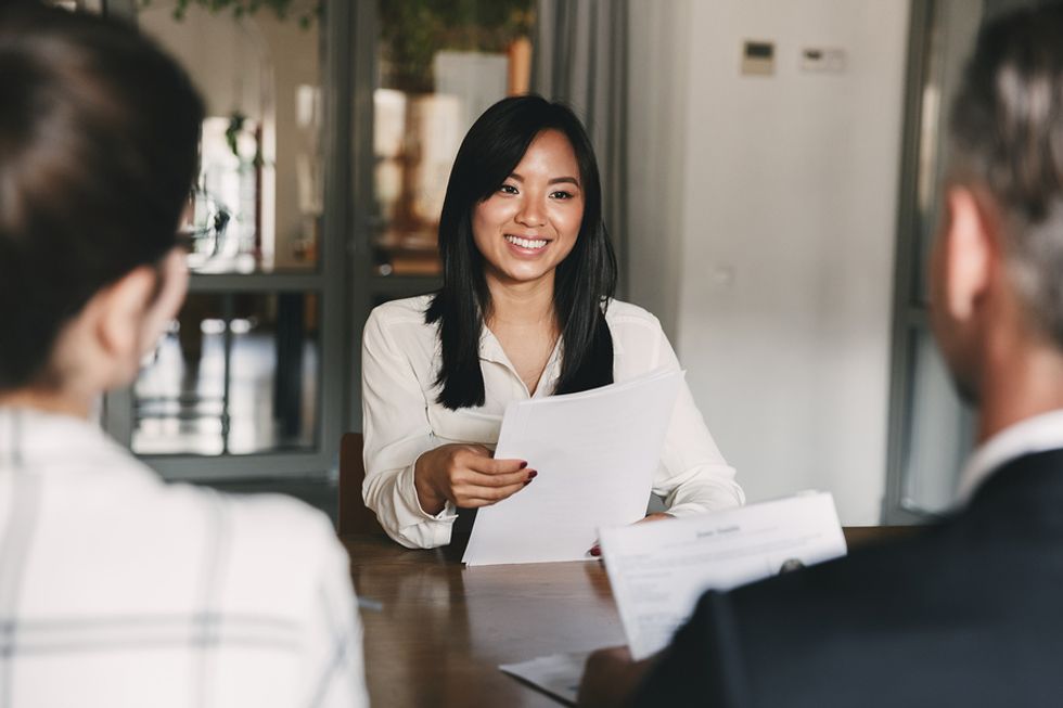 Woman lies to the hiring managers during a job interview