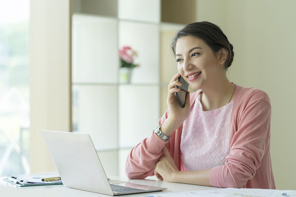 Woman listens during a phone screen