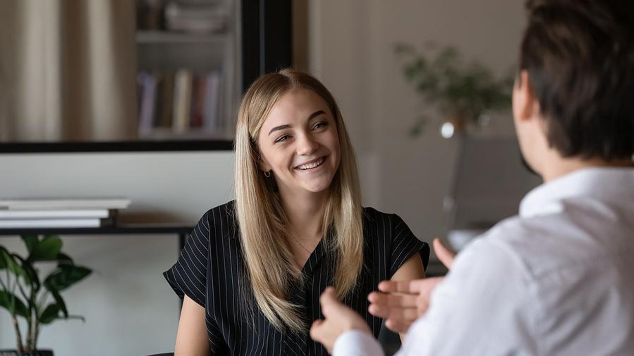 Woman listens to an interview question