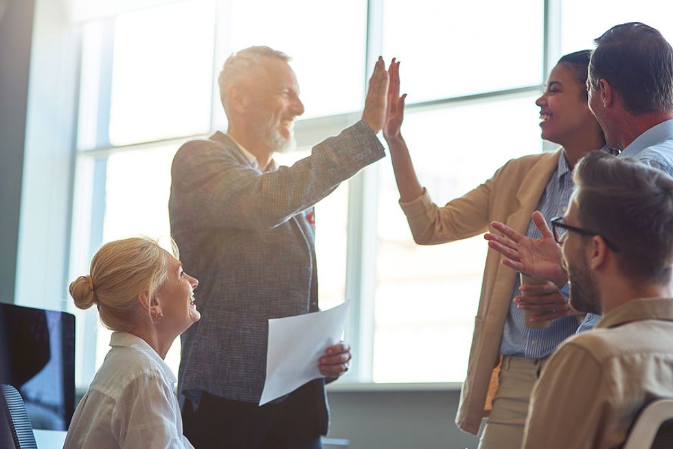 Woman looking for a raise gets congratulated by her boss