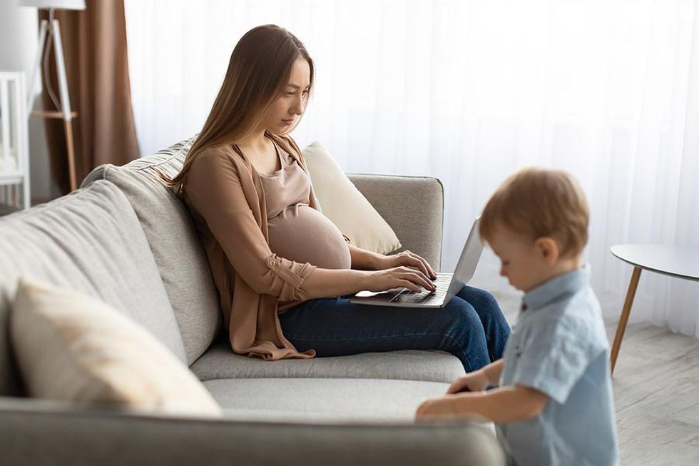 Woman looks for a job while pregnant