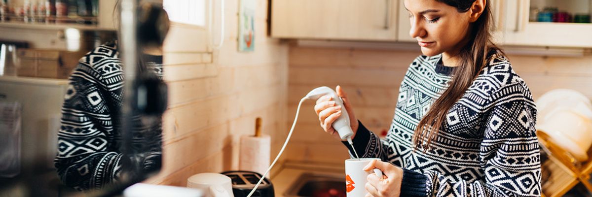 Woman makes whipped coffee before work