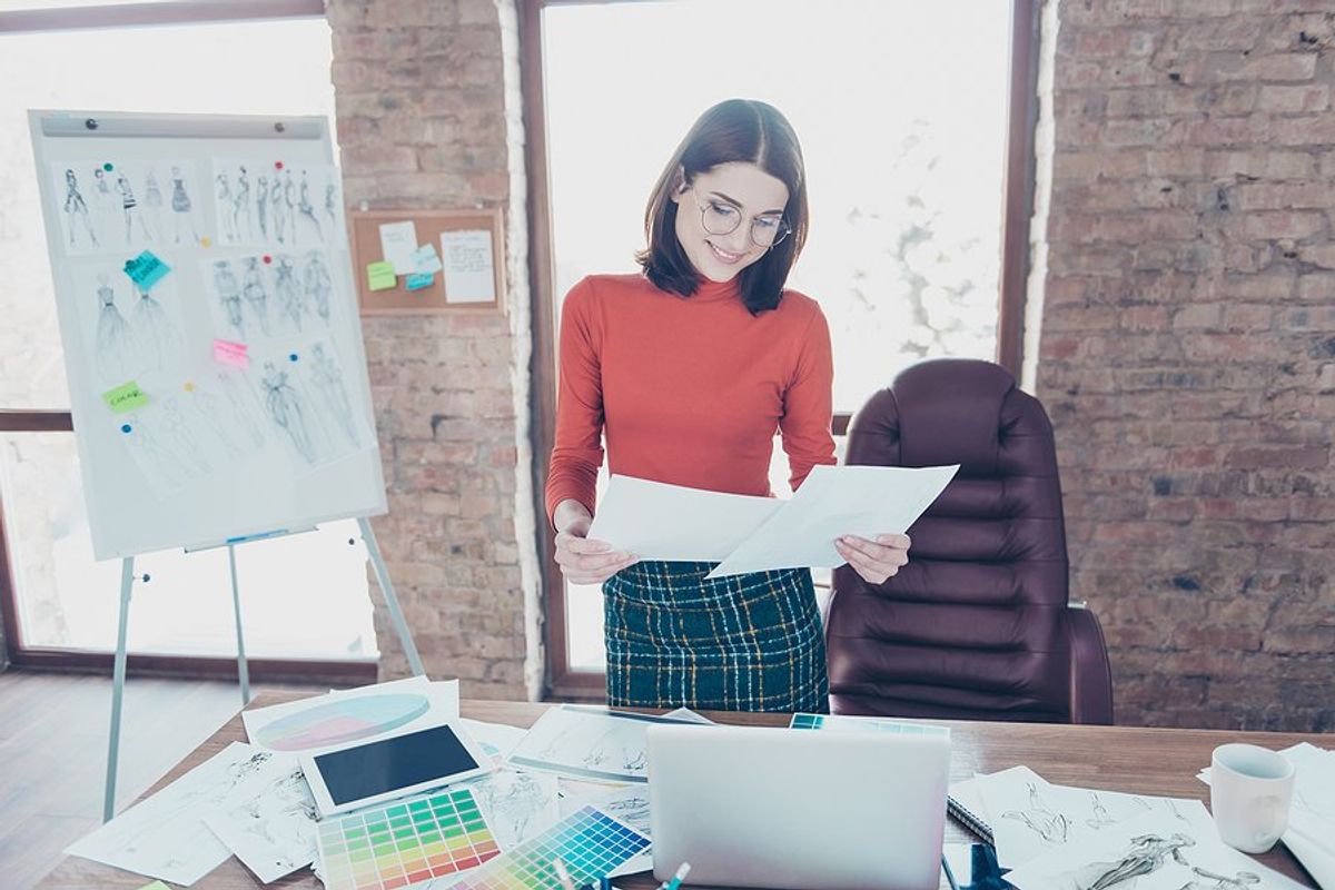 Woman manages a project in the apparel industry