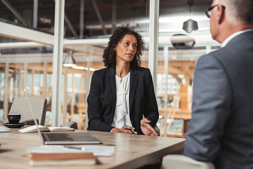 Woman negotiates a better salary during a job interview