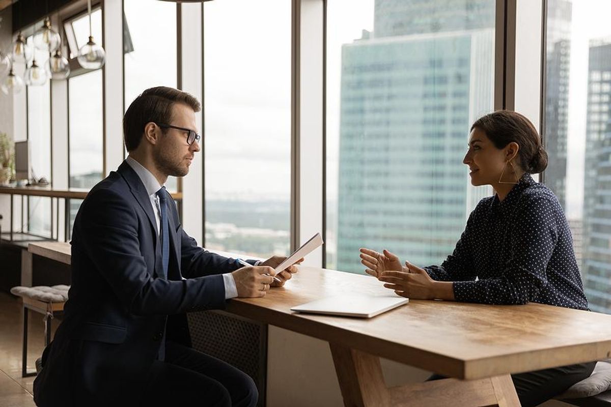Woman negotiates her salary during a job interview
