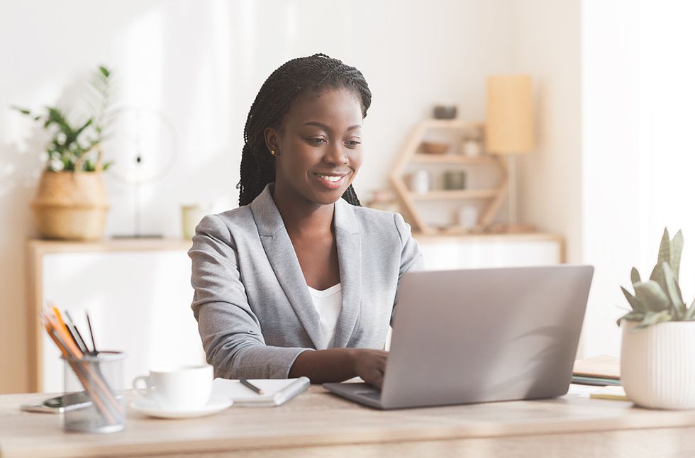Woman networks on her laptop for an effective job search