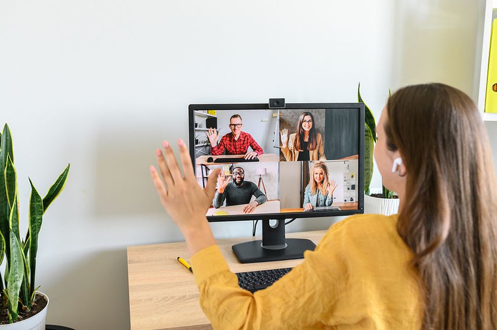 Woman on a virtual interview for a remote job