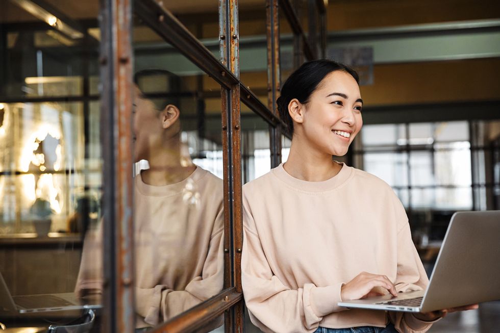 Woman on laptop doesn't let failure phase her