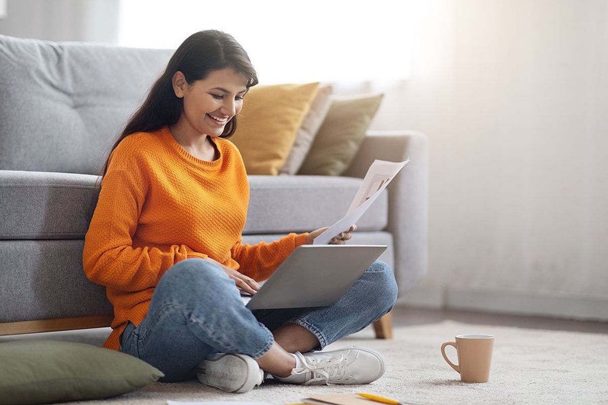 Woman on laptop gets an interview fast
