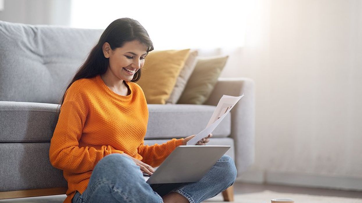 Woman on laptop gets an interview fast