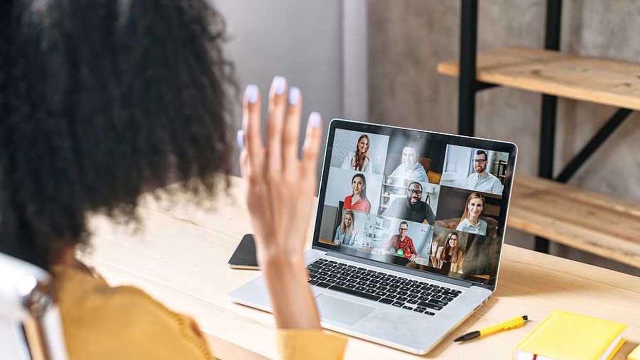Woman on laptop joins an online community that provides accountability