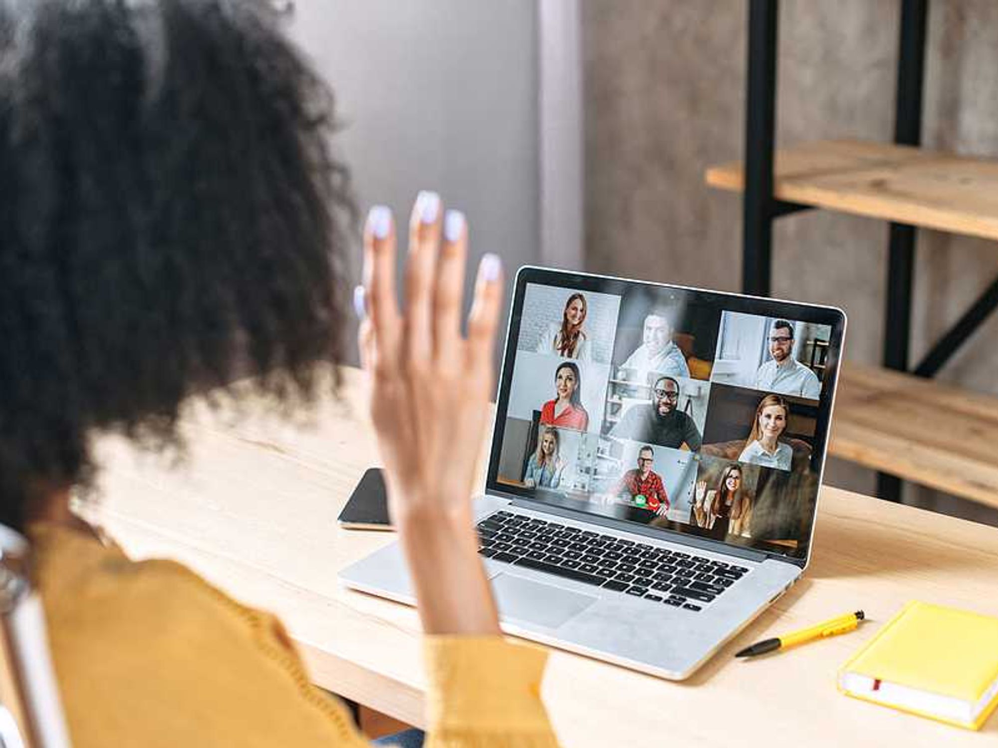 Woman on laptop joins an online community that provides accountability