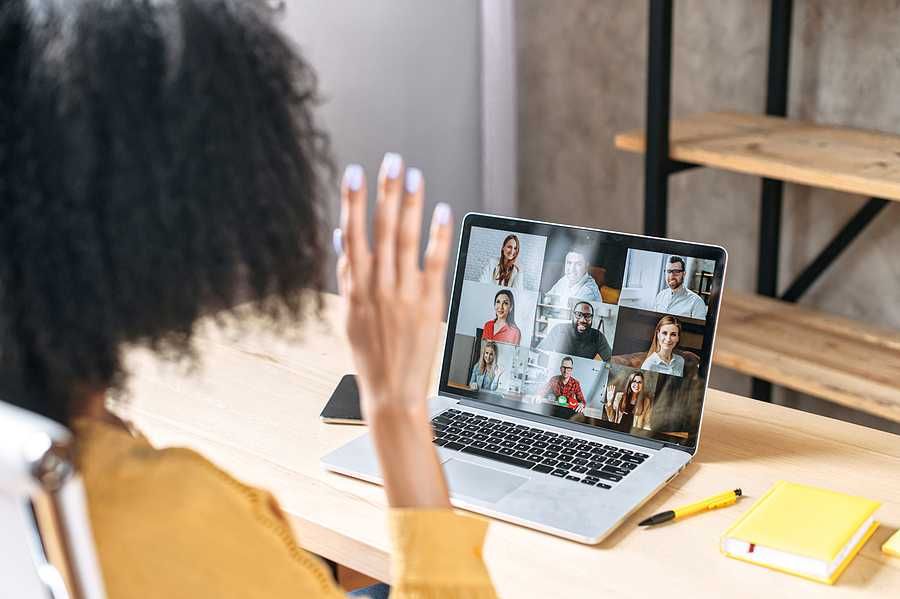 Woman on laptop joins an online community that provides accountability