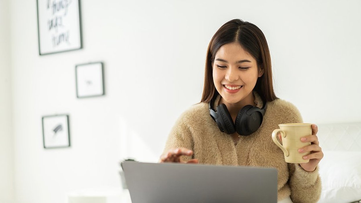 Woman on laptop looks for a job with no experience