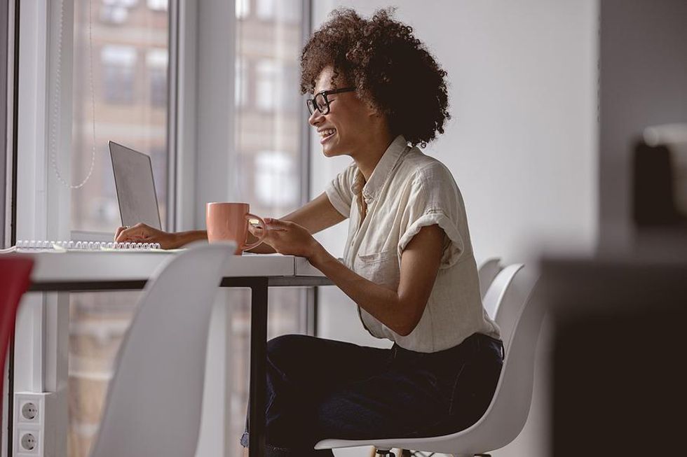 Woman on laptop sees what skills she got endorsed for on LinkedIn