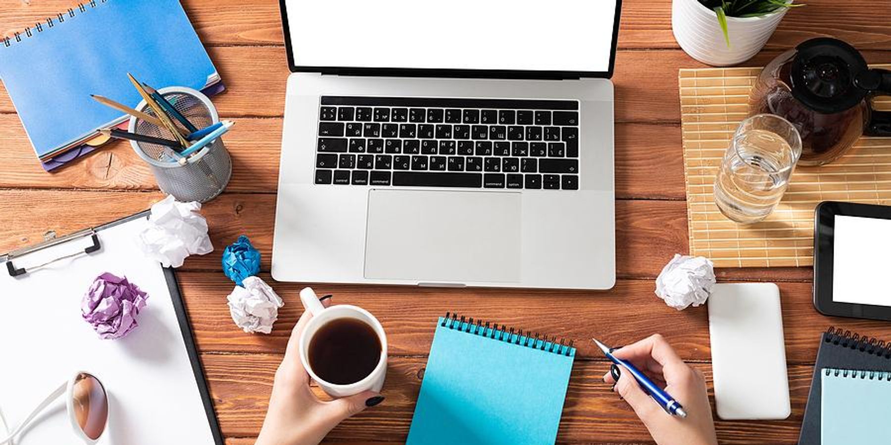 Woman on laptop works on a project