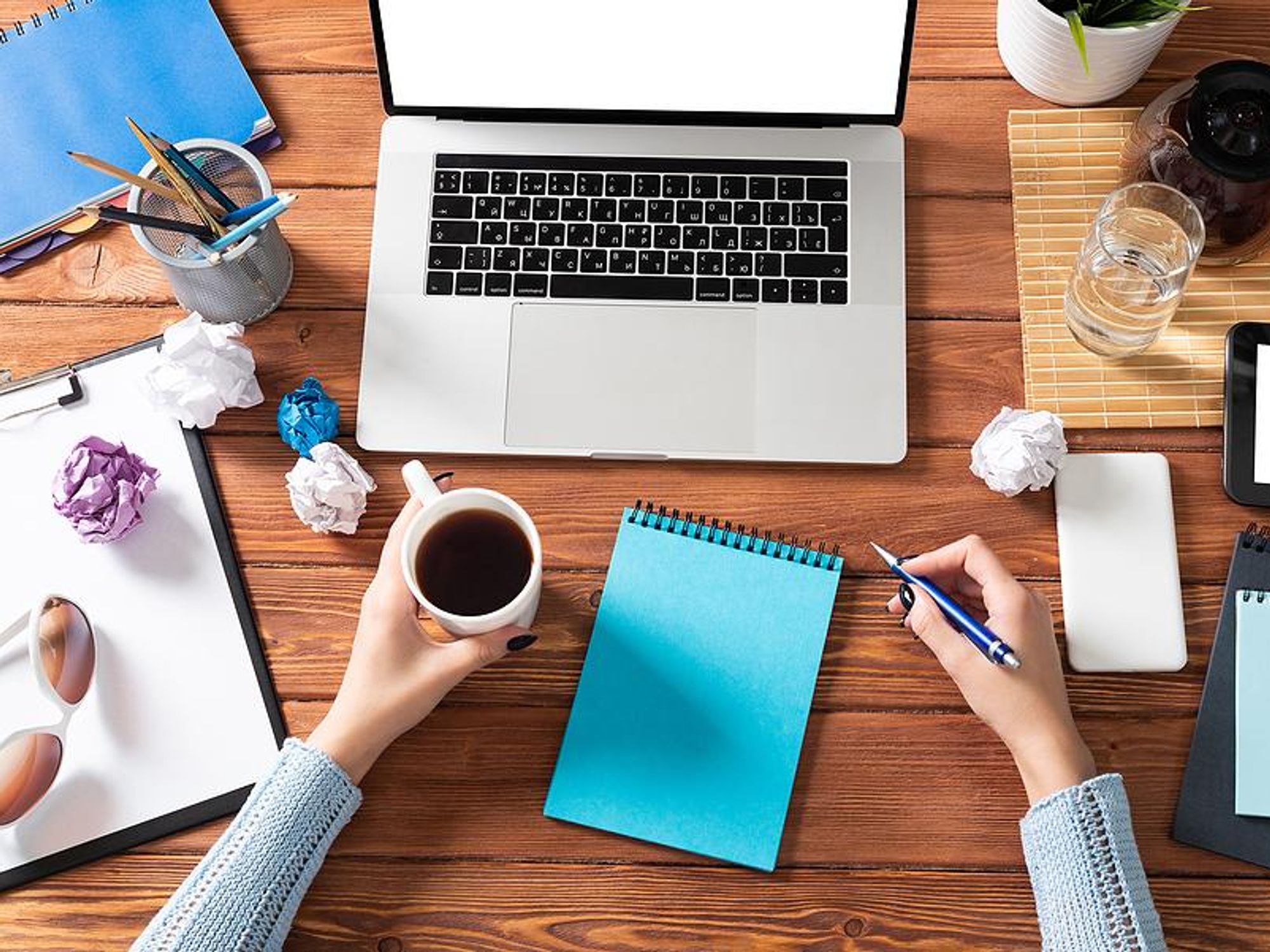 Woman on laptop works on a project