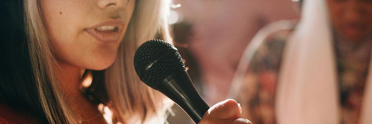 Woman practices her public speaking skills