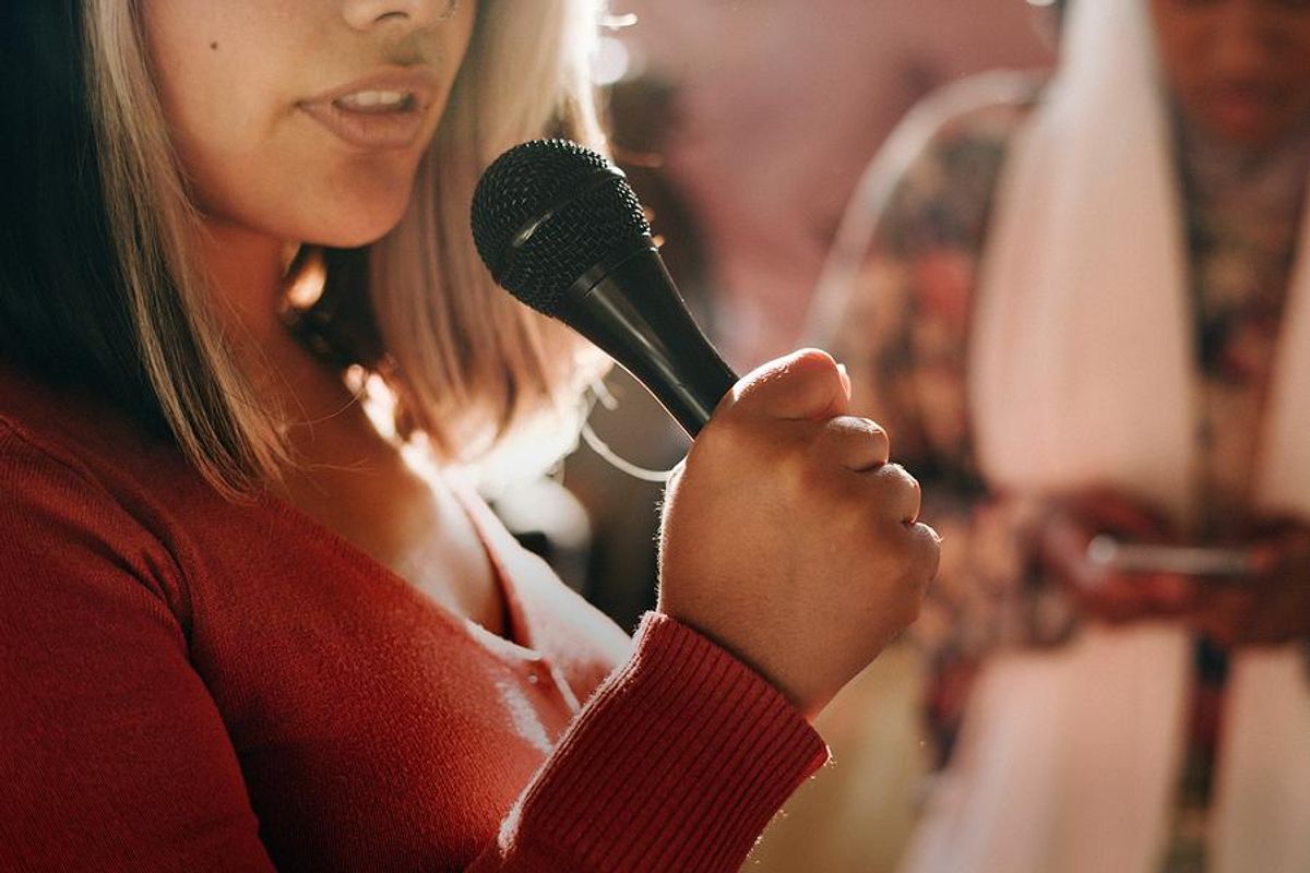 Woman practices her public speaking skills